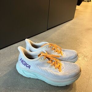 Hoka Clifton White Shoes with Orange Accents